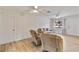 Bright living room with two recliners and wood-look floors at 20096 Tappan Zee Dr, Port Charlotte, FL 33952