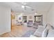 Spacious living room with hardwood floors and a dining area at 20096 Tappan Zee Dr, Port Charlotte, FL 33952
