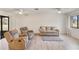 Living room with tiled floors, and two armchairs at 20096 Tappan Zee Dr, Port Charlotte, FL 33952