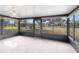 Bright sunroom with view of backyard and surrounding landscape at 20096 Tappan Zee Dr, Port Charlotte, FL 33952