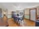 Traditional dining room with parquet floors and a large window, perfect for Gathering gatherings at 217 46Th W St, Bradenton, FL 34209