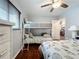 Bedroom with bunk beds and a full-size bed, offering versatile sleeping arrangements at 2468 Quail Ter, Port Charlotte, FL 33981