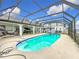 Enjoy this large pool and screened enclosure with spa at 2468 Quail Ter, Port Charlotte, FL 33981