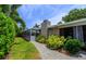 Pathway to screened enclosure and pool area at 2502 Alpine Ave, Sarasota, FL 34239
