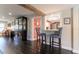 Cozy breakfast nook with two blue chairs and a view into the kitchen at 2502 Alpine Ave, Sarasota, FL 34239