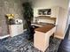 Home office features built-in desk and cabinets, providing ample workspace at 2502 Alpine Ave, Sarasota, FL 34239