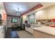 Updated kitchen with stainless steel appliances and farm sink at 2502 Alpine Ave, Sarasota, FL 34239