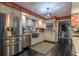 Renovated kitchen with stainless steel appliances and white cabinets at 2502 Alpine Ave, Sarasota, FL 34239