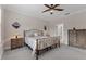 Spacious bedroom with a comfortable bed and plenty of closet space at 26954 Pavin Dr, Englewood, FL 34223