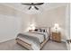 Well-lit bedroom with a comfortable bed and nightstands at 26954 Pavin Dr, Englewood, FL 34223