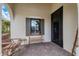 Relaxing front porch with seating and a view of the street at 26954 Pavin Dr, Englewood, FL 34223