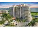 Luxury high-rise building with waterfront views and resort-style amenities at 3060 Grand Bay Blvd # 175, Longboat Key, FL 34228