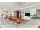 Open floor plan with white kitchen, wood floors and expansive windows at 3060 Grand Bay Blvd # 175, Longboat Key, FL 34228