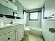 Clean bathroom with white subway tile and updated vanity at 360 Flamingo Rd, Venice, FL 34293