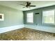 Bonus room with unique terrazzo flooring and ceiling fan at 360 Flamingo Rd, Venice, FL 34293