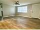 Spacious living area with wood-look flooring and ceiling fan at 360 Flamingo Rd, Venice, FL 34293