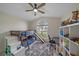bedroom with bunk beds, workspace, and ample storage at 3712 62Nd E Ave, Bradenton, FL 34203