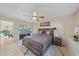 Main bedroom with king bed and access to the patio at 3712 62Nd E Ave, Bradenton, FL 34203