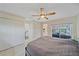Main bedroom with king bed and access to the patio at 3712 62Nd E Ave, Bradenton, FL 34203