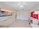 Bright bedroom with tile floors, ceiling fan, and ample closet space at 3712 62Nd E Ave, Bradenton, FL 34203