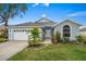 Newly renovated one story home with attached garage and beautifully landscaped lawn at 3712 62Nd E Ave, Bradenton, FL 34203
