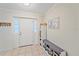 Bright and welcoming foyer with shoe storage and coat rack at 3712 62Nd E Ave, Bradenton, FL 34203