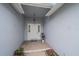 Inviting front entry with tiled flooring and a white door at 3712 62Nd E Ave, Bradenton, FL 34203
