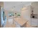 Spacious kitchen featuring an island and view to backyard at 3712 62Nd E Ave, Bradenton, FL 34203