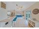 Kitchen boasts a breakfast bar and access to backyard at 3712 62Nd E Ave, Bradenton, FL 34203
