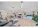 Open living area features a fireplace and modern design at 3712 62Nd E Ave, Bradenton, FL 34203