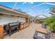 This outdoor kitchen features a grill and bar at 3712 62Nd E Ave, Bradenton, FL 34203