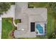 Bird's-eye view of home showcasing roofline, pool, and landscaping at 3826 E 155Th E Ave, Parrish, FL 34219
