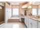Large Primary bathroom with granite vanity and soaking tub at 3826 E 155Th E Ave, Parrish, FL 34219