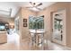 Bright breakfast nook with access to the backyard and lanai at 3826 E 155Th E Ave, Parrish, FL 34219