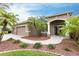 Two-story home with a paved walkway, palm trees, and a two-car garage at 3826 E 155Th E Ave, Parrish, FL 34219