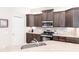 Modern kitchen with stainless steel appliances and ample counter space at 3826 E 155Th E Ave, Parrish, FL 34219