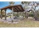Wooden pavilion with picnic tables overlooking a tranquil river at 3826 E 155Th E Ave, Parrish, FL 34219