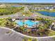 Aerial view of community pool and amenities at 4109 Quiet Rain Ct, Palmetto, FL 34221