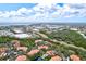 Aerial view of community with pool and surrounding landscape at 4110 Central Sarasota Pkwy # 136, Sarasota, FL 34238