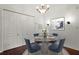 Elegant dining area featuring a round table and four chairs at 4110 Central Sarasota Pkwy # 136, Sarasota, FL 34238