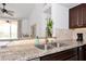 Modern kitchen with granite counters and stainless steel appliances at 4110 Central Sarasota Pkwy # 136, Sarasota, FL 34238