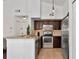 Modern kitchen with granite counters and stainless steel appliances at 4110 Central Sarasota Pkwy # 136, Sarasota, FL 34238