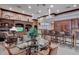Community lounge with a kitchenette and seating area at 4110 Central Sarasota Pkwy # 136, Sarasota, FL 34238