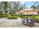 Community picnic area with tables and grills at 4110 Central Sarasota Pkwy # 136, Sarasota, FL 34238