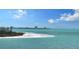 Island with white sand beach and teal water at 415 L Ambiance Dr # A701, Longboat Key, FL 34228