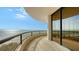 Spacious balcony overlooking the ocean and sandy beach at 415 L Ambiance Dr # A701, Longboat Key, FL 34228