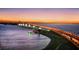 Scenic bridge view at sunset, with city skyline in the background at 415 L Ambiance Dr # A701, Longboat Key, FL 34228