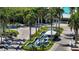 Gated entrance to condo community with fountains and landscaping at 415 L Ambiance Dr # A701, Longboat Key, FL 34228