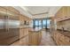Modern kitchen with granite island and stainless steel appliances at 415 L Ambiance Dr # A701, Longboat Key, FL 34228