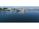 Calm marina with several yachts and boats at 415 L Ambiance Dr # A701, Longboat Key, FL 34228